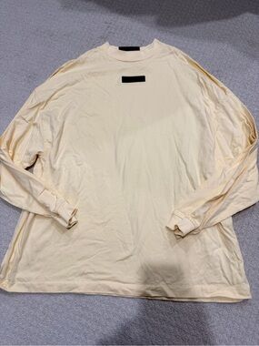 Essentials Men's Long-Sleeve Crewneck in Pale Yellow